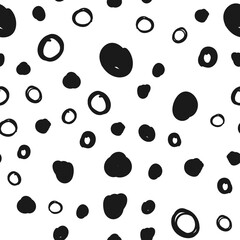 Doodle circles seamless pattern. Black dots texture background.