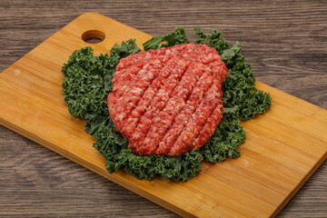Raw beef burger cutlet for cooking