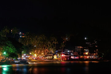 Fototapeta na wymiar Night life scene on Unawatuna Beach in Sri Lanka