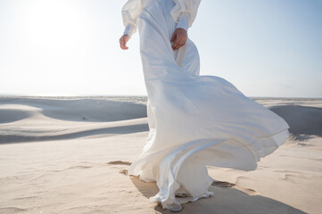 Bride's dress floating in the wind
