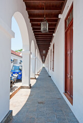 The open air colonnaded archway of unidentified building in Galle, Sri Lanka