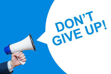 Man's Hand Holding Megaphone With Speech Bubble DON'T GIVE UP. Announcement And Advertising