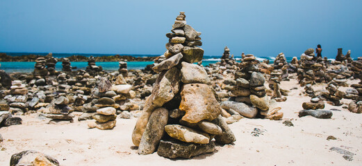 rock on the shout of baby beach in Aruba in southern Antilles islands of ABC 