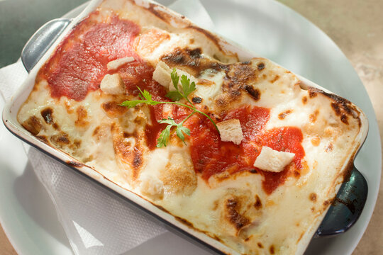 baked pencake with cheese sauce