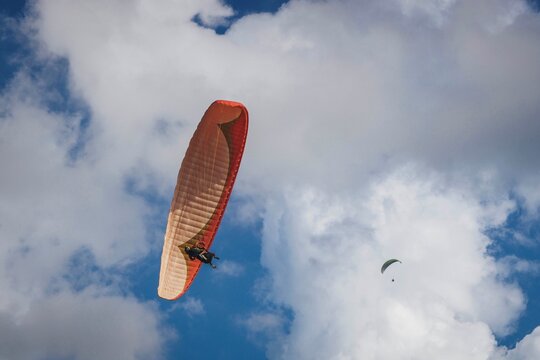 kite surfing on the blue sky