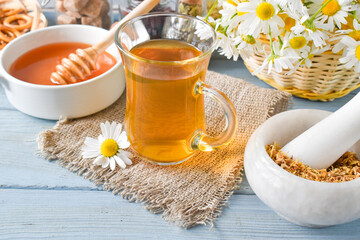 Chamomile tea in a transparent Cup.