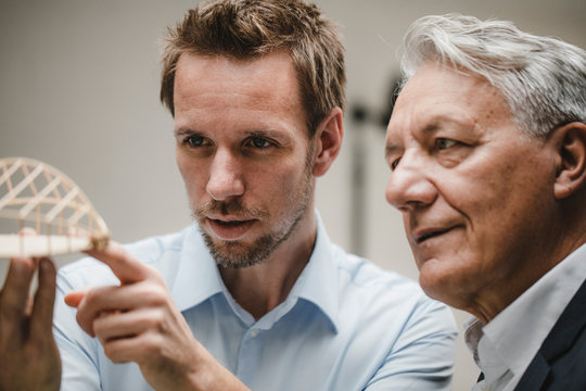 Architect presenting architectural modell to client