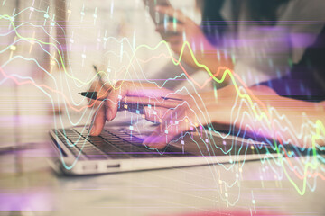 Multi exposure of woman hands typing on computer and financial graph hologram drawing. Stock market analysis concept.