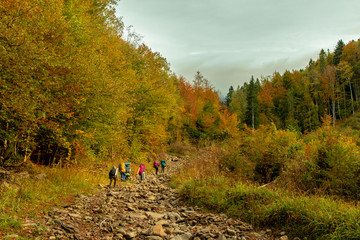 Obraz premium group of people hiking mountain autumn picturesque landscape nature environment space in September season