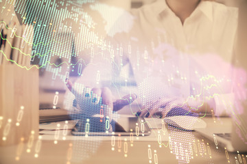 Double exposure of forex chart sketch hologram and woman holding and using a mobile device. Financial market concept.