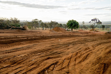 Land that local Indigenous people were living on that is being cleared out to make room for a new...
