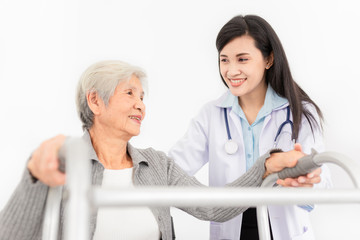 close up doctor, walk training and rehabilitation process, old asian stroke patient learning to uses walker with female asian doctor in hospital, elderly healthcare promotion