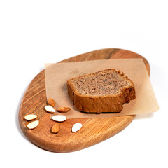 Fototapeta na wymiar Fresh slice of bread on a rustic table