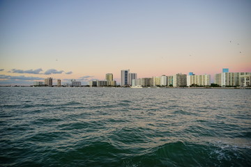 Obraz premium Miami downtown skyscrapers and beach at sun set 