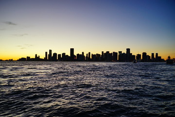 Miami beach skyscrapers at sun set	