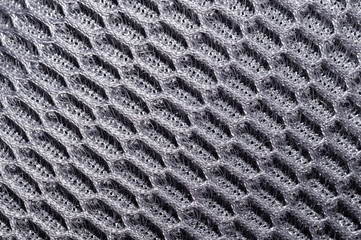 Gray fabric texture macro. textile background. knitted pattern. woven material