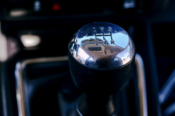 Manual transmission shift selector vor a luxury vehicle. 