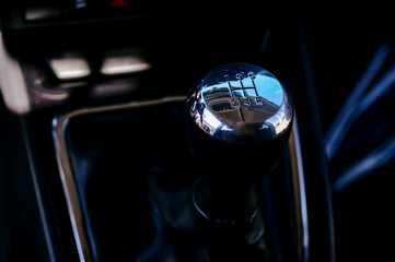 Manual transmission shift selector vor a luxury vehicle. 