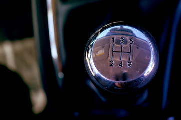 Manual transmission shift selector vor a luxury vehicle. 