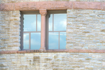 windows in a stone wall