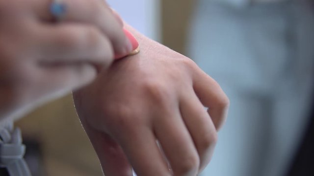 Make up foundation on hand, beauty blander sponge, visage atrist, close up