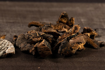 dried pine mushrooms on a table