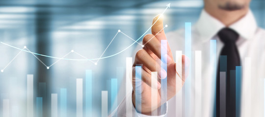 Businessman plan graph growth increase of chart positive indicators in his business