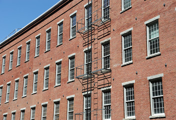 Fototapeta na wymiar close up on old brick wall factory building