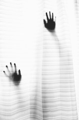 Two shadows of hands