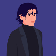 Portrait of a young man with medium length hair and in a suit