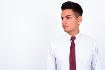 Portrait of young handsome multi ethnic businessman