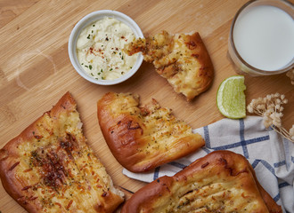 Spice naan bread with sour dipping cream