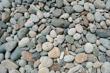 Background. Polished marine gray pebbles
