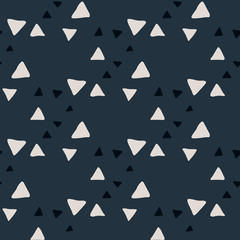 Contrast seamless pattern with doodle triangle silhouettes. Dark background with light geometric elements.