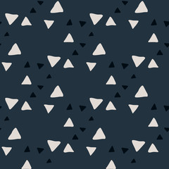 Contrast seamless pattern with doodle triangle silhouettes. Dark background with light geometric elements.