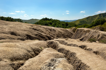 Erosion of the soil, weathering, the formation of ravines and cracks