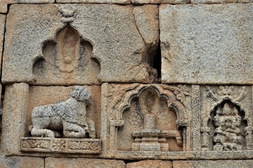 stone carving on the wall of temple
