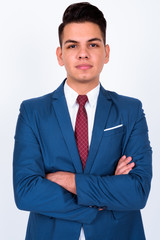 Portrait of young handsome multi ethnic businessman in suit