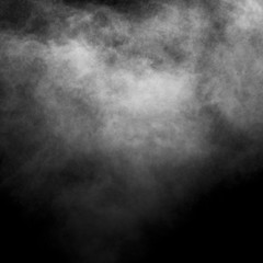 Fototapeta premium Smoke, steam, vape isolated on black background, looks like a cloud. Abstract background, design element