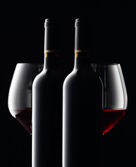Red wine on a black background.