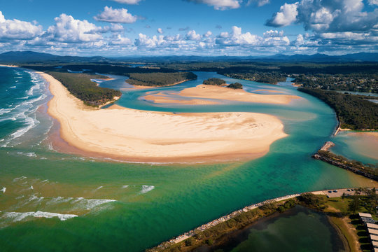 Aerial Photograph Stunning Nambucca River in Forster Beach NSW Australia from Captain Cook Lookout Beautiful Horizon with Clouds Green Water Waves Breaking Green Wild Nature Sandbar Curved Waterway