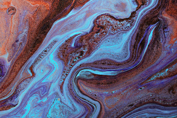 Modern fluid art. Abstract colorful background with swirl of acrylic pouring paints.