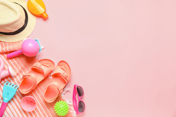 Fototapeta premium Set of beach accessories for children on color background