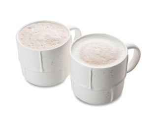 Cups of hot coffee on white background