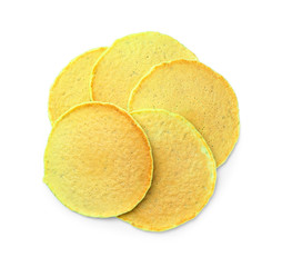 Tasty green pancakes on white background