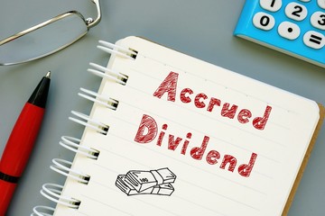 Business concept meaning Accrued Dividend with inscription on the page.