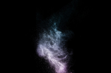 Fototapeta na wymiar purple and deep blue powder explosion with black space