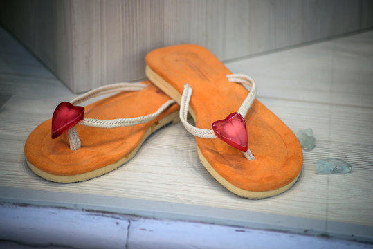 Closeup Of Orange Flip Flop Sandals In A Fashion Store Showroom