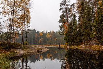 Autumn landscape of the lake with reflection