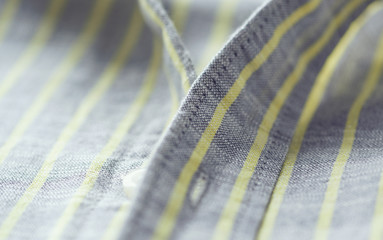 Close up of men's striped shirt.	